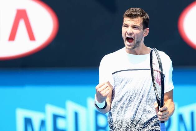 Grigor Dimitrov of Bulgaria celebrates after scoring in their men s singles third round match of the 2015 Australian Open tennis tournament in Melbourne, Victoria, Australia, 23 January 2015.  20150123_26591
