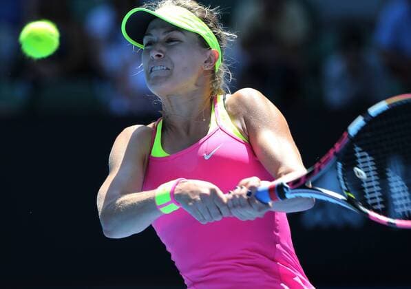 (150123) -- MELBOURNE, Jan. 23, 2015 -- Eugenie Bouchard of Canada returns the ball during the third round match of women s singles at the 2015 Australian Open tennis tournament in Melbourne, Australia, Jan. 23, 2015. 