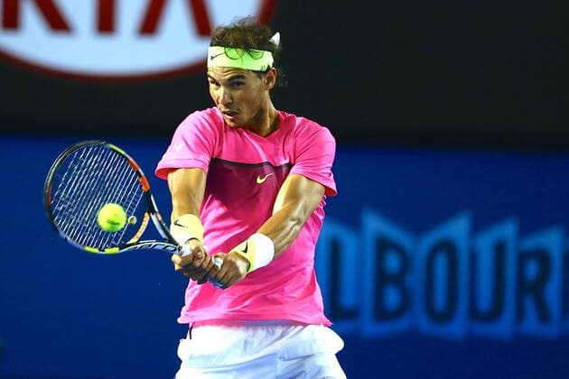Rafael Nadal of Spain returns a shot at third round match of 2015 Australian Open tennis tournament in Melbourne. 23 January 2015.  20150123_31142