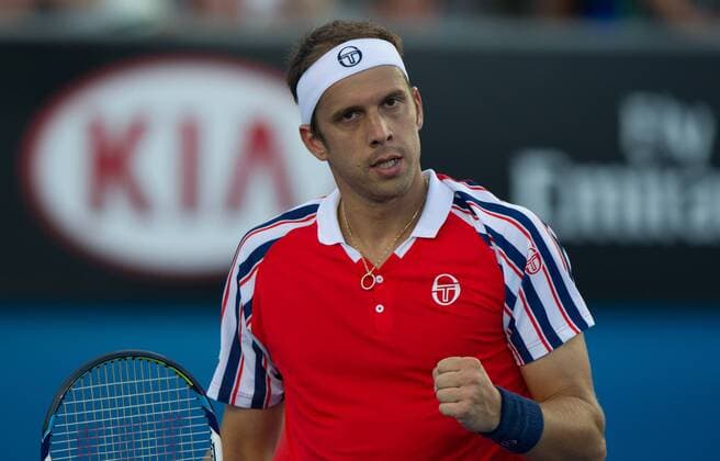 (150124) -- MELBOURNE, Jan. 24, 2015 -- Gilles Muller of Luxembourg celebrates during the men s singles third round match at the 2015 Australian Open tennis tournament at Melbourne Park in Melbourne, Australia, Jan. 24, 2015. (SP)AUSTRALIA-MELBOURNE-TENNIS-MULLER BaixXue 