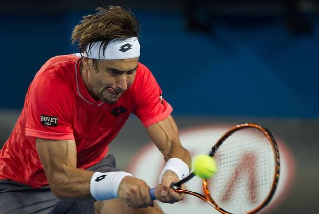 (150124) -- MELBOURNE, Jan. 24, 2015 -- David Ferrer of Spain returns the ball during the men s singles third round match at the 2015 Australian Open tennis tournament at Melbourne Park in Melbourne, Australia, Jan. 24, 2015. (SP)AUSTRALIA-MELBOURNE-TENNIS-FERRER BaixXue 