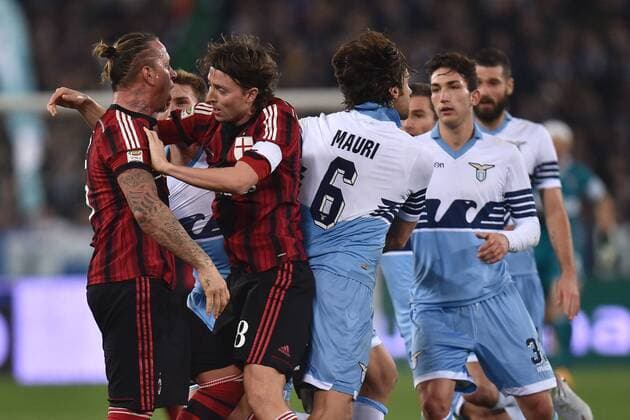 Philippe Mexes Milan argues with Stefano Mauri Lazio - Serie A Lazio Rom - Milan AC - Foto AndreaxStaccioli Insidefoto andreaxstaccioli