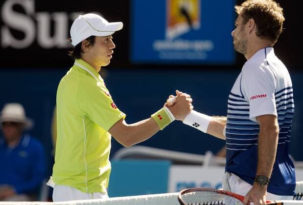 TENNIS - ATP Tennis Herren Australian Open 2015 MELBOURNE,AUSTRALIA,28.JAN.15 - TENNIS - ATP World Tour, Grand Slam, Australian Open. Image shows Kei Nishikori (JPN) and Stanislas Wawrinka (SUI).