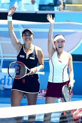 Yung-Jan Chan of Chinese Taipei and Jie Zheng of China in action in their semifinal doubles match during day 10 of the 2015 Australian Open at Melbourne Park on January 28, 2015 in Melbourne, Australia.  CFP462411204 