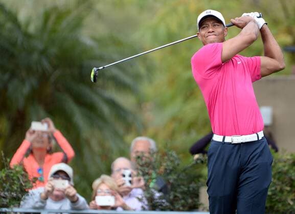 Tiger Woods watches his tee shot on the second hole of the Waste Management Phoenix Open at the Fairmont Scottsdale Princes golf course in Scottsdale, Arizona January 29, 2015.  PXP2015012910 ARTxFOXALL