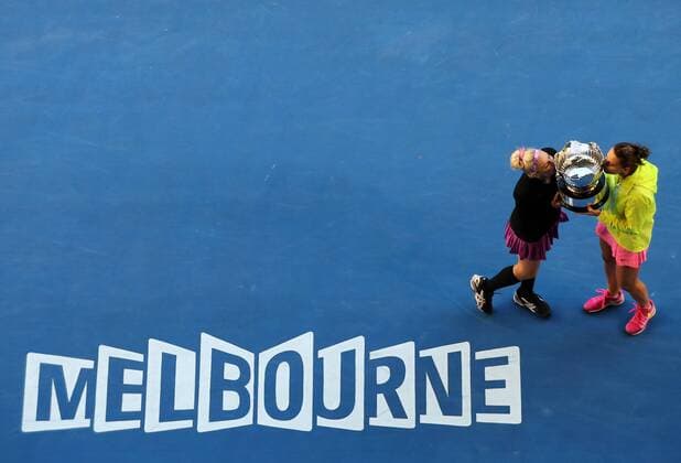(150130) -- MELBOURNE, Jan. 30, 2015 -- Bethanie Mattek-Sands (L) of the U.S.and Lucie Safarova of the Czech Republic celebrate after winning their women s doubles final at the 2015 Australian Open tennis tournament at Melbourne Park in Melbourne, Australia, Jan. 30, 2015. WOMEN S DOUBLES FINAL XuxYanyan 
