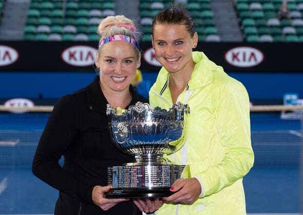 Bethanie Mattek-Sands (L) of the U.S. and Lucie Safarova of the Czech Republic pose with their trophy after winning their women s doubles final at the 2015 Australian Open tennis tournament at Melbourne Park in Melbourne, Australia, Jan. 30, 2015. (SP)AUSTRALIA-MELBOURNE-TENNIS-AUSTRALIA OPEN-WOMEN S DOUBLES FINAL BaixXue 