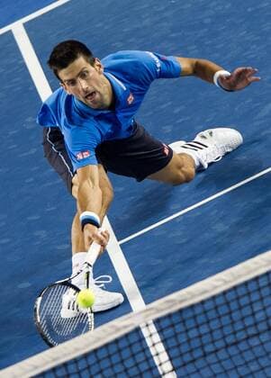 Serbia s Novak Djokovic returns the ball during his men s singles semifinal match at the Australian Open tennis championship in Melbourne, Australia, Jan. 30, 2015. (SP)AUSTRALIA-MELBOURNE-TENNIS-AUSTRALIAN OPEN-MEN S SINGLES SEMIFINAL BaixXue 