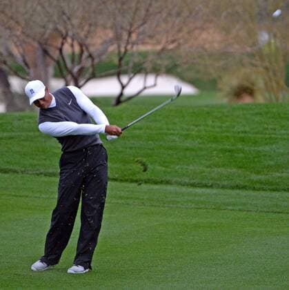 Tiger Woods hits his second shot on the tenth hole of the second round of the Waste Management Phoenix Open at the Fairmont Scottsdale Princes golf course in Scottsdale, Arizona January 30, 2015.  PXP2015013002 ARTxFOXALL