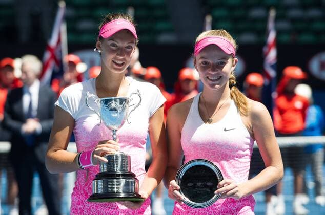 (150131) -- MELBOURNE, Jan. 31, 2015 -- Tereza Mihalikova (L) of Slovakia and Katie Swan of Britain show their trophies after the Junior Girls Singles final match at the 2015 Australian Open tennis tournament at Melbourne Park in Melbourne, Australia, Jan. 31, 2015. Mihalikova won 2-0. ) (SP)AUSTRALIA-MELBOURNE-TENNIS-AUSTRALIAN OPEN-JUNIOR GIRLS SINGLES BaixXue 