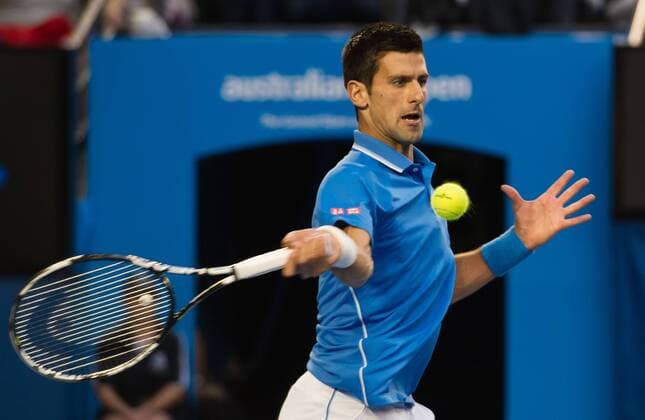 (150201) -- MELBOURNE, Feb. 1, 2015 -- Novak Djokovic of Serbia returns the ball during his men s singles final match at 2015 Australian Open tennis tournament at Melbourne Park in Melbourne, Australia on Feb. 1, 2015. BaixXue 