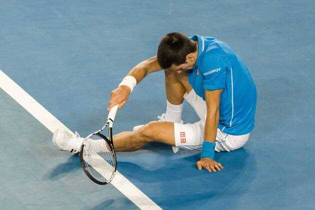 February 1, 2015: 1st seed Novak Djokovic (SRB) slips on the baseline in the Men s Final match on day fourteen of the 2015 Australian Open grand slam tennis tournament at Melbourne Park in Melbourne, Australia. - ZUMAc04_