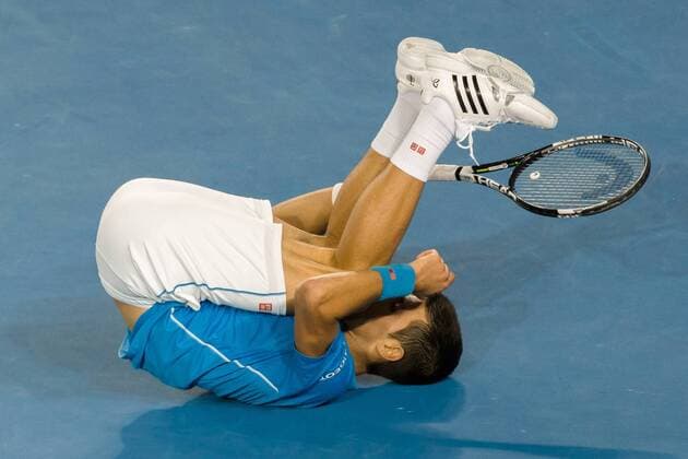 February 1, 2015: 1st seed Novak Djokovic (SRB) slips on the baseline in the Men s Final match on day fourteen of the 2015 Australian Open grand slam tennis tournament at Melbourne Park in Melbourne, Australia. - ZUMAc04_