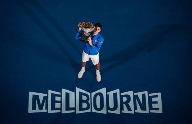(150201) -- MELBOURNE, Feb. 1, 2015 -- Novak Djokovic of Serbia poses with the trophy after winning his men s singles final match at 2015 Australian Open tennis tournament at Melbourne Park in Melbourne, Australia on Feb. 1, 2015. BaixXue 