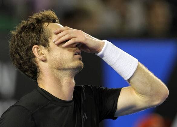 (150201) -- MELBOURNE, Feb. 1, 2015 -- Andy Murray of Great Britain reacts during his men s singles final match at 2015 Australian Open tennis tournament at Melbourne Park in Melbourne, Australia on Feb. 1, 2015. Murray lost 1-3. JinxLinpeng 