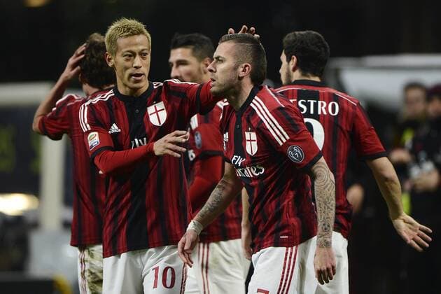Aktuell Fußball, Italien, Serie A, AC Mailand - FC Parma Esultanza dopo il gol di Jeremy Menez Milan con Keisuke Honda. Goal celebration Serie A AC Mailand - FC Parma giuseppexceleste