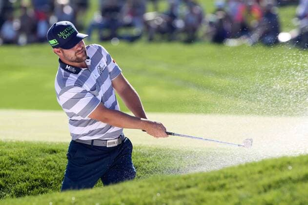 Feb. 1, 2015 - Scottsdale, Arizona, United States - Ryan Moore hits out of a bunker on the 18th hole during the final round of the Waste Management Phoenix Open at TPC at Scottsdale. PGA Golf Herren Golf 2015 - Waste Management Phoenix Open - Final Round - ZUMAw109