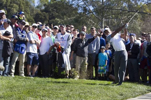 Feb. 5, 2015 - San Diego, California, U.S. - TIGER WOODS in the rough near the cart path on the 11th hole. Golf 2015 - Farmers Insurance Open - Round 1 - ZUMAs44_