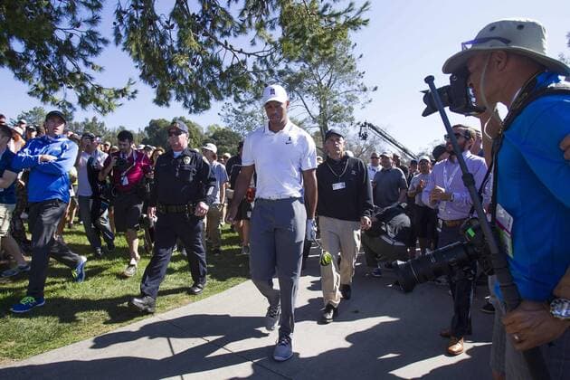 Feb. 5, 2015 - San Diego, California, U.S. - TIGER WOODS in the rough near the cart path on the 11th hole. Woods dropped out of the first round at the Farmers Insurance Open after his back gave him trouble. Golf 2015 - Farmers Insurance Open - Round 1 - ZUMAs44_