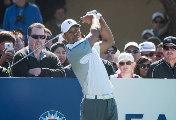 Feb. 5, 2015 - Torery Pines, California, USA - Tiger Woods hits his tee shot on the 10th hole of the north course during first round of the Farmers Insurance Open at Torrey Pines Golf Course on February 5, 2015 in San Diego, California. Farmers Insurance Open 2015 - ZUMAg139