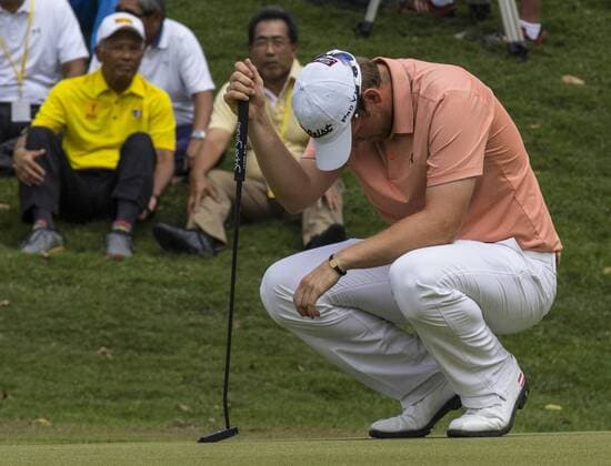 Feb. 8, 2015 - Kuala Lumpur, Malaysia - Bernd Wiesberger of Austria reacts after missed a shot at 18th green during the final round of Maybank Malaysia Open golf tournament in Kuala Lumpur, Malaysia, 8 February 2015. Golf Malaysia Open 2015  - ZUMAn230