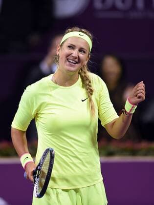 (150224) -- DOHA, Feb. 23, 2015 -- Victoria Azarenka of Belarus celebrates after the first round match against AngeliqueKerber of Germany in the WTA Tennis Damen Qatar Open tennis tournament in Doha, Qatar, Feb. 23, 2015. Victoria Azarenka won 2-0. ) (SP)QATAR-DOHA-TENNIS-WTA ChenxShaojin 