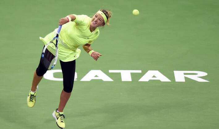 (150224) -- DOHA, Feb. 23, 2015 -- Victoria Azarenka of Belarus competes during the first round match against AngeliqueKerber of Germany in the WTA Tennis Damen Qatar Open tennis tournament in Doha, Qatar, Feb. 23, 2015. Victoria Azarenka won 2-0. ) (SP)QATAR-DOHA-TENNIS-WTA ChenxShaojin 