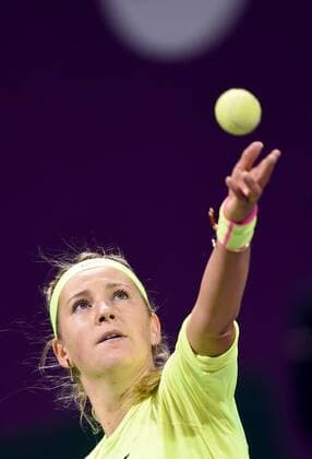 (150224) -- DOHA, Feb. 23, 2015 -- Victoria Azarenka of Belarus serves during the first round match against AngeliqueKerber of Germany in the WTA Tennis Damen Qatar Open tennis tournament in Doha, Qatar, Feb. 23, 2015. Victoria Azarenka won 2-0. ) (SP)QATAR-DOHA-TENNIS-WTA ChenxShaojin 