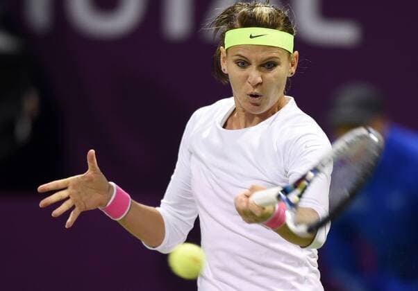 (150224) -- DOHA, Feb. 23, 2015 -- Lucie Safarova of the Czech Republic returns the ball during the first round match against SamanthaStosur of Australia in the WTA Tennis Damen Qatar Open tennis tournament in Doha, Qatar, Feb. 23, 2015. Lucie Safarova won 2-0. ) (SP)QATAR-DOHA-TENNIS-WTA ChenxShaojin 