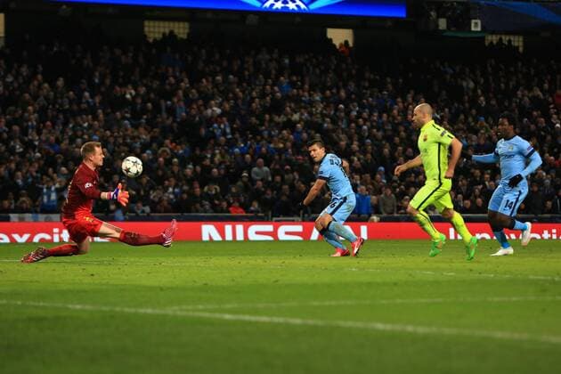 Sergio Kun Aguero of Manchester City scores his sides first goal - Manchester City vs. Barcelona - UEFA Champions League - Etihad Stadium - Manchester - EDITORIAL USE ONLY. No use with unauthorised audio, video, data, fixture lists, club league logos or live services. Online in-match use limited to 120 images, no video emulation. No use in betting, games or single club league player publications.