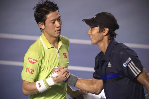 ACAPULCO, Feb. 25, 2015 -- Kei Nishikori (L) shakes hands with Lu Yen Hsun after their men s single at the Abierto Mexicano Telcel tennis tournament in Acapulco Feb. 25, 2015. (SP) ACAPULCO-TENNIS-OPEN AlejandroxAyala 