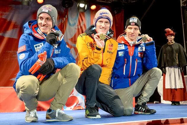 NORDIC SKIING - FIS Nordic WC Falun 2015 FALUN,SWEDEN,27.FEB.15 - NORDIC SKIING, Ski jumping Skispringen Ski nordisch - FIS Nordic World Ski Championships, large hill, men, award ceremony. Image shows Gregor Schlierenzauer (AUT), Severin Freund (GER) and Rune Velta (NOR).