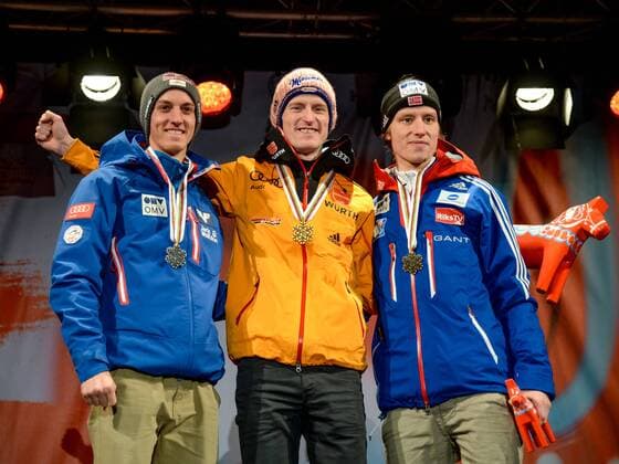 NORDIC SKIING - FIS Nordic WC Falun 2015 FALUN,SWEDEN,27.FEB.15 - NORDIC SKIING, Ski jumping Skispringen Ski nordisch - FIS Nordic World Ski Championships, large hill, men, award ceremony. Image shows Gregor Schlierenzauer (AUT), Severin Freund (GER) and Rune Velta (NOR).