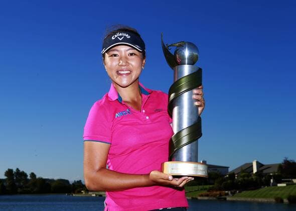 01.03.2015. Clearwater, New Zealand. Lydia Ko of New Zealand poses with the trophy following play at the ISPS Handa New Zealand Womens Open - Final Round, golf tournament held at Clearwater, 1 March 2015. xJosephxJohnsonx  ActionPlus11601537