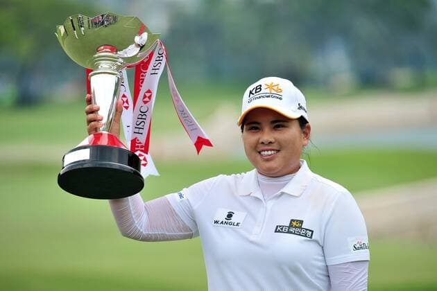 (150308) -- SINGAPORE, Mar. 8, 2015 -- Inbee Park of South Korea poses with the trophy after winning the 2015 HSBC Women s Champions golf tournament at Singapore s Sentosa Golf Club Serapong Course, Mar. 8, 2015. Inbee Park finished with a combined score of 273 on the final day of the HSBC Women s Champions and claimed the champion. ) (SP)SINGAPORE-GOLF-HSBC WOMEN S CHAMPIONS ThenxChihxWey 