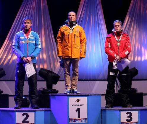 BIATHLON - IBU WC Kontiolahti 2015 KONTIOLAHTI,FINLAND,08.MAR.15 - BIATHLON - IBU World Championships, 12,5km pursuit, men, Medal Plaza, award ceremony. Image shows Anton Shipulin (RUS), Erik Lesser (GER) and Tarjei Boe (NOR).