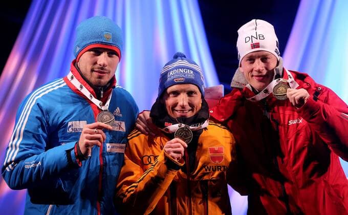 BIATHLON - IBU WC Kontiolahti 2015 KONTIOLAHTI,FINLAND,08.MAR.15 - BIATHLON - IBU World Championships, 12,5km pursuit, men, Medal Plaza, award ceremony. Image shows Anton Shipulin (RUS), Erik Lesser (GER) and Tarjei Boe (NOR).