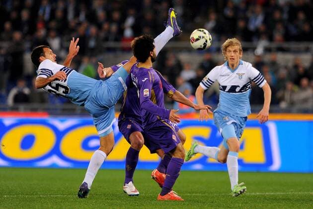 09.03.2015. Rome, Italy. Serie A Football. Lazio versus Fiorentina. Diego Novaretti (Laz) challenges Mohamed Salah (Fio) xGiuseppexMaffiax  ActionPlus11603756