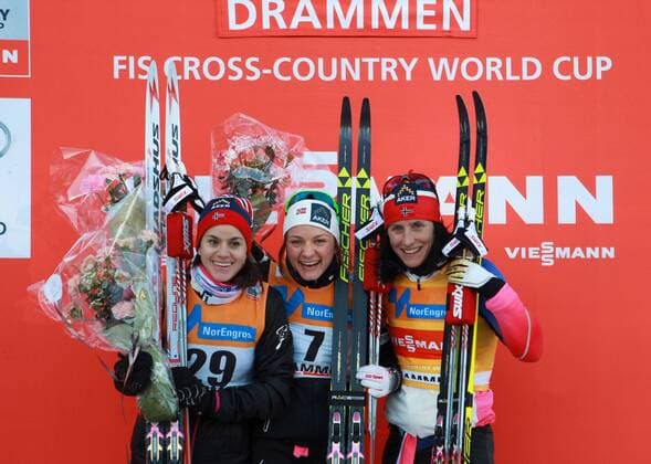 NORDIC SKIING - FIS WC Drammen DRAMMEN,NORWAY,11.MAR.15 - NORDIC SKIING, CROSS COUNTRY SKIING - FIS World Cup, sprint, ladies, award ceremony. Image shows the rejoicing of Heidi Weng, Maiken Caspersen Falla and Marit Bjoergen (NOR).