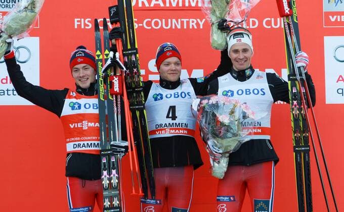 NORDIC SKIING - FIS WC Drammen DRAMMEN,NORWAY,11.MAR.15 - NORDIC SKIING, CROSS COUNTRY SKIING - FIS World Cup, sprint, men, award ceremony. Image shows the rejoicing of Finn Haagen Krogh (NOR), Paal Golberg (NOR) and Sindre Bjoernestad Skar (NOR).