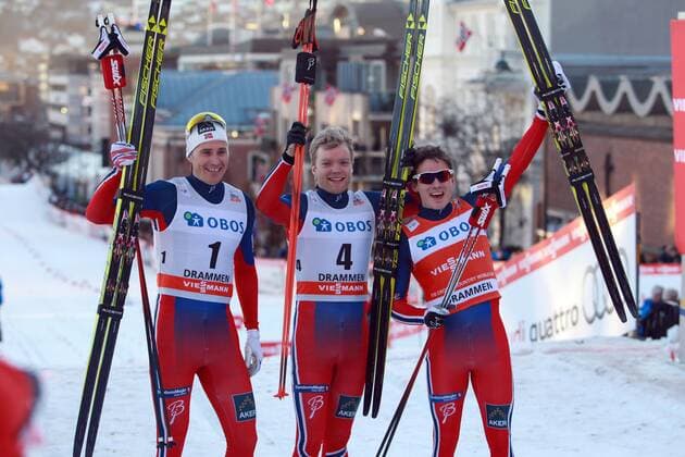 NORDIC SKIING - FIS WC Drammen DRAMMEN,NORWAY,11.MAR.15 - NORDIC SKIING, CROSS COUNTRY SKIING - FIS World Cup, sprint, men. Image shows the rejoicing of Finn Haagen Krogh (NOR), Paal Golberg (NOR) and Sindre Bjoernestad Skar (NOR).