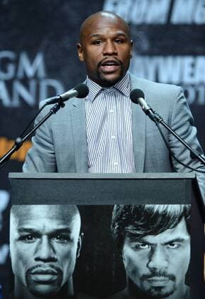 U.S. boxer Floyd Mayweather addresses the media promoting his upcoming boxing match with boxer Manny Pacquiao of the Philippines during a news conference in Los Angeles on March 11, 2015. The fight is set for May 2nd in Las Vegas.  LAP2015031111 JIMxRUYMEN