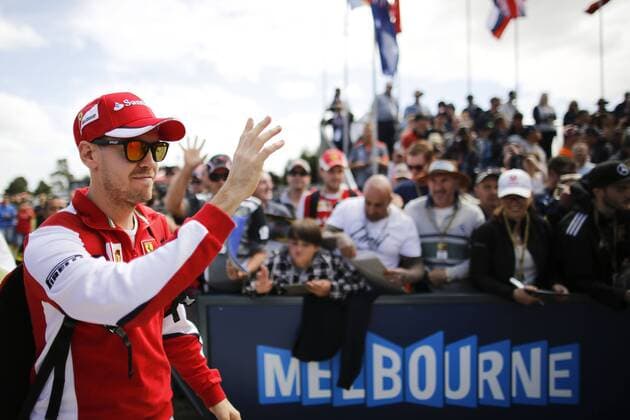 March 12, 2015 - Melbourne, Australia - SEBASTIAN VETTEL of Germany and Scuderia Ferrari waves to the fans during preparations of the 2015 Australian Grand Prix at Albert Park Circuit in Melbourne, Australia. F1 2015 - Australian Grand Prix - Preparations - ZUMAg147
