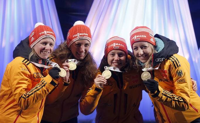 BIATHLON - IBU WC Kontiolahti 2015 KONTIOLAHTI,FINLAND,14.MAR.15 - BIATHLON - IBU World Championships, relay 4x6km, ladies, Medal Plaza, award ceremony. Image shows Franziska Hildebrand, Vanessa, Hinz, Laura Dahlmeier Franziska Preuss (GER).