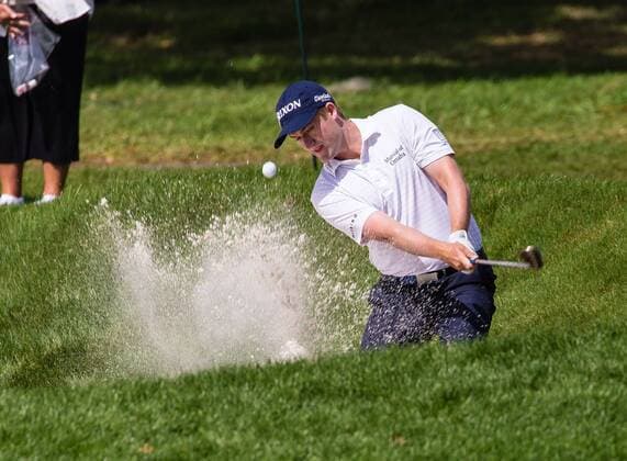 3 14 2015 - Palm Harbor FL, USA - Russel Knox with a shot out of the bunker on the 1st hole at the Innisbrook Resort (Copperhead) in Palm Harbor FL. DelMecum Cal Media PGA Golf Herren Golf 2015: Valspar Championship Round 3 MARCH 14 - ZUMAc04_