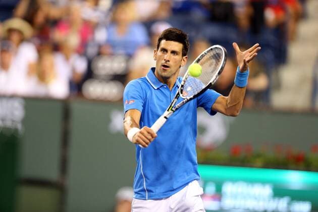 14 March, 2015 : Novak Djokovic of Serbia returns a shot in his match against Marcos Baghdatis of Cyprus during the BNP Paribas Open at Indian Wells Tennis Garden in Indian Wells, California.Charles Baus CSM TENNIS 2015: BNP Paribas Open MAR 14 - ZUMAcb8_