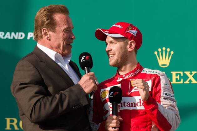 March 15, 2015: Arnold Schwarzenegger congratulates Sebastian Vettel (DEU) 5 (3rd) on the podium at the 2015 Australian Formula One Grand Prix at Albert Park, Melbourne, Australia. Sydney Low Cal Media Formula One 2015: Australia MAR 15 - ZUMAc04_