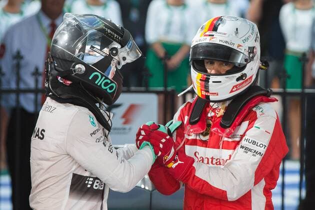 March 15, 2015: Nico Rosberg (DEU) 6 from the Mercedes AMG Petronas F1 Team and Sebastian Vettel (DEU) 5 from the Scuderia Ferrari team congratulate each other after coming 2nd and 3rd at the 2015 Australian Formula One Grand Prix at Albert Park, Melbourne, Australia. Sydney Low Cal Media Formula One 2015: Australia MAR 15 - ZUMAc04_
