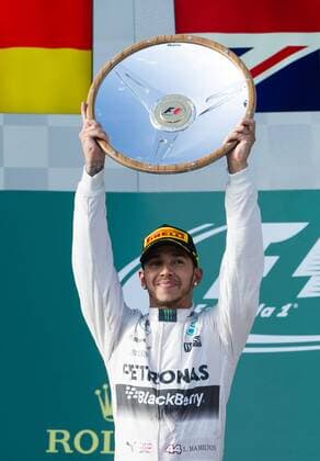 (150315) -- MELBOURNE, March 15, 2015 -- Mercedes AMG Petronas Formula One driver Lewis Hamilton of Britain celebrates after winning the Australian Formula One Grand Prix at the Albert Park circuit in Melbourne, Australia, March 15, 2015. ) (SP)AUSTRALIA-MELBOURNE-F1-WINNER BaixXue 