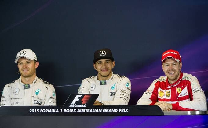 (150315) -- MELBOURNE, March 15, 2015 -- Mercedes AMG Petronas Formula One driver Lewis Hamilton (C) of Britain and his teammate Nico Rosberg (L) of Germany and Scuderia Ferrari Formula One driver Sebastian Vettel of Germany attend a post-race press conference PK Pressekonferenz after the Australian Formula One Grand Prix at the Albert Park circuit in Melbourne, Australia, March 15, 2015. Lewis Hamilton won the Australian Formula One Grand Prix by clocking at 1:31.54.067. ) Authorized by ytfs (SP)AUSTRALIA-MELBOURNE-F1-WINNER-PRESS CONFERENCE BaixXue 